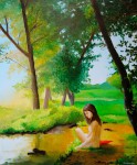 femme assise au bord d'un ruisseau